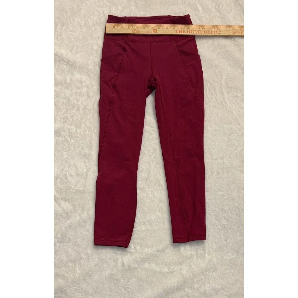 Lululemon Time To Sweat Crops Ruby Red Reflective Cuffs Logo Pockets Size 4